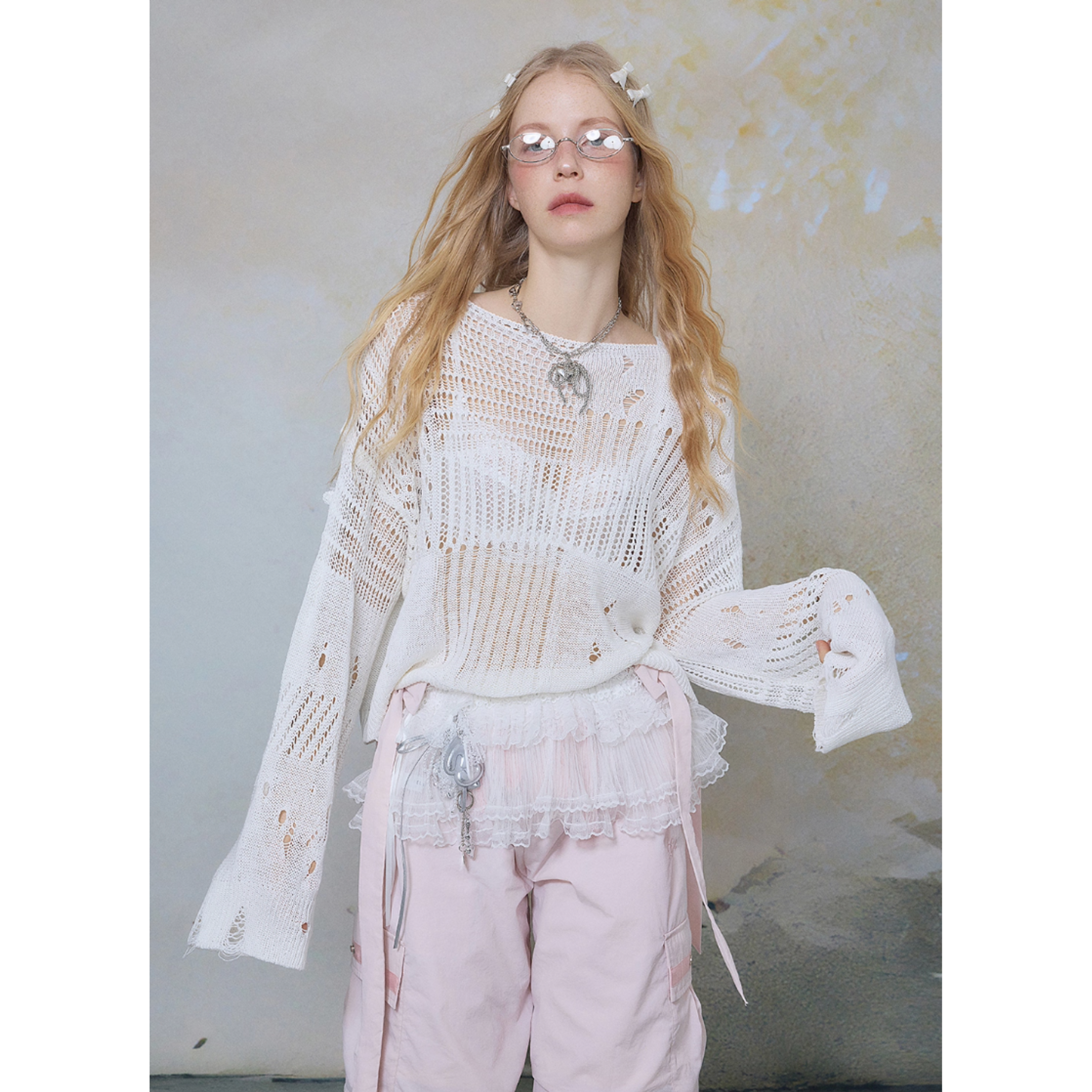 Distressed mesh knit top